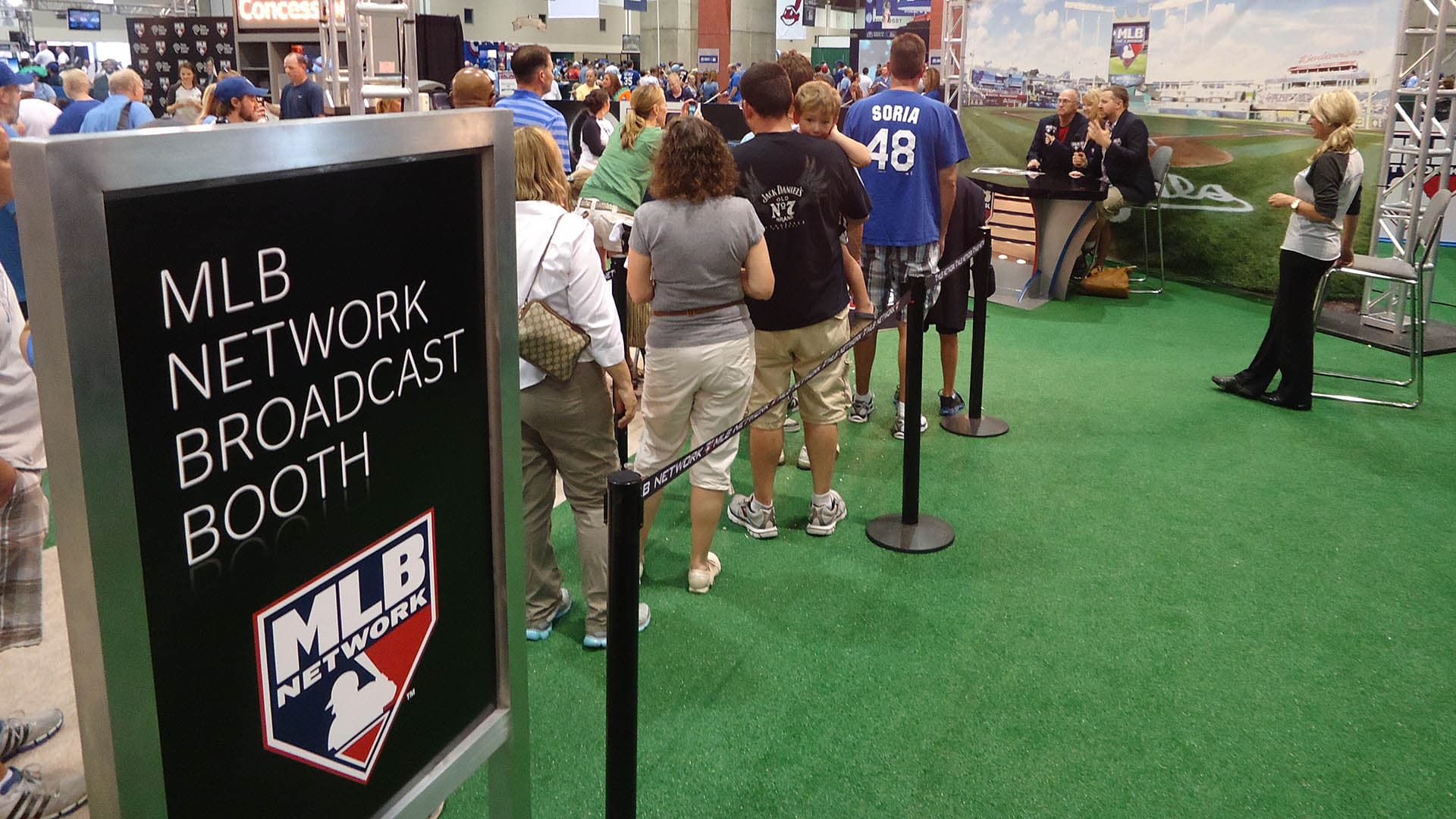 People waiting in line for the new MLB Network booth