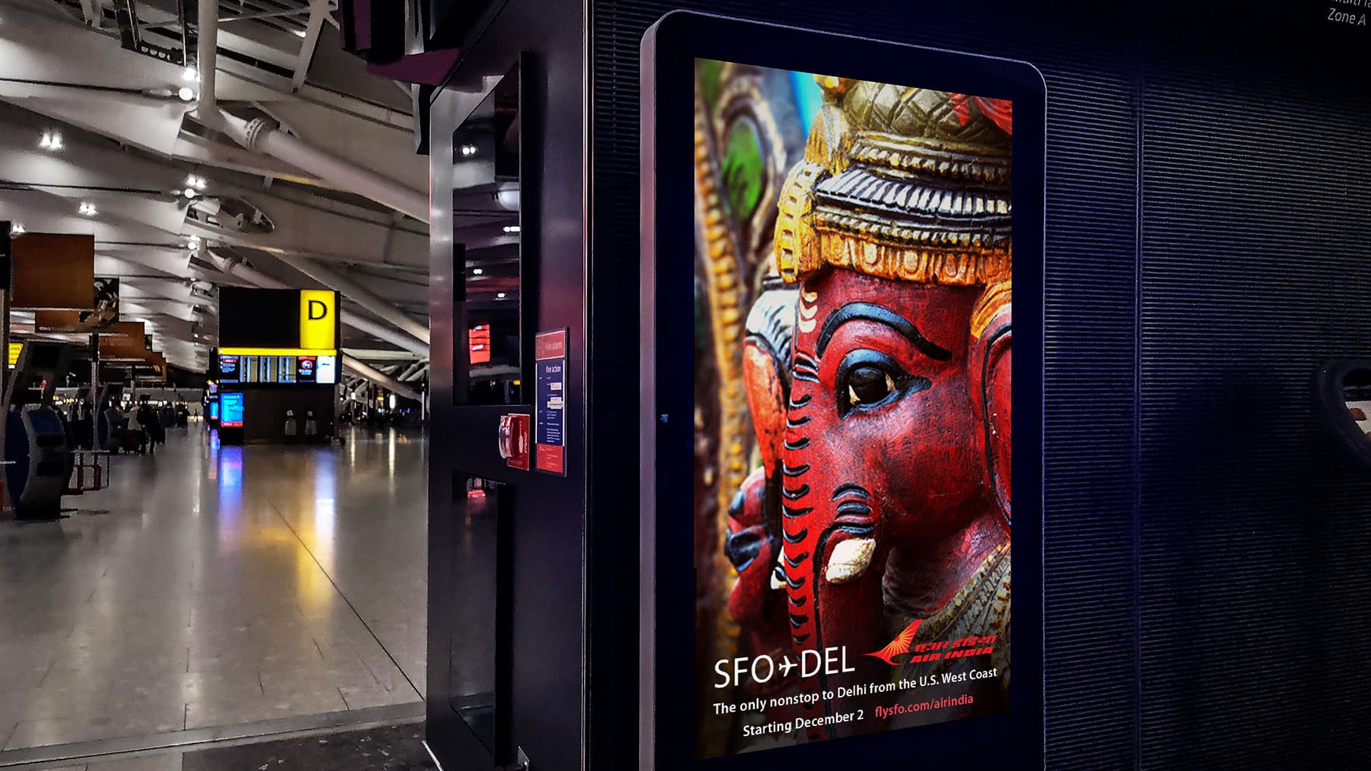 An out-of-home ad featuring a wooden red elephant.
